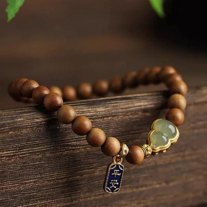 Taoist Feng Shui Sandalwood Jade Gourd Bracelet - For Harmony & Protection